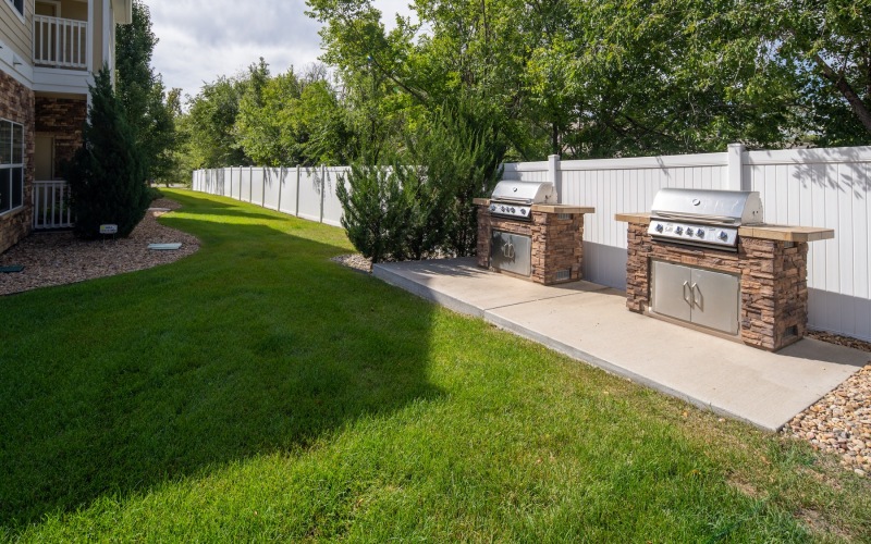 Grilling station and lush landscaping