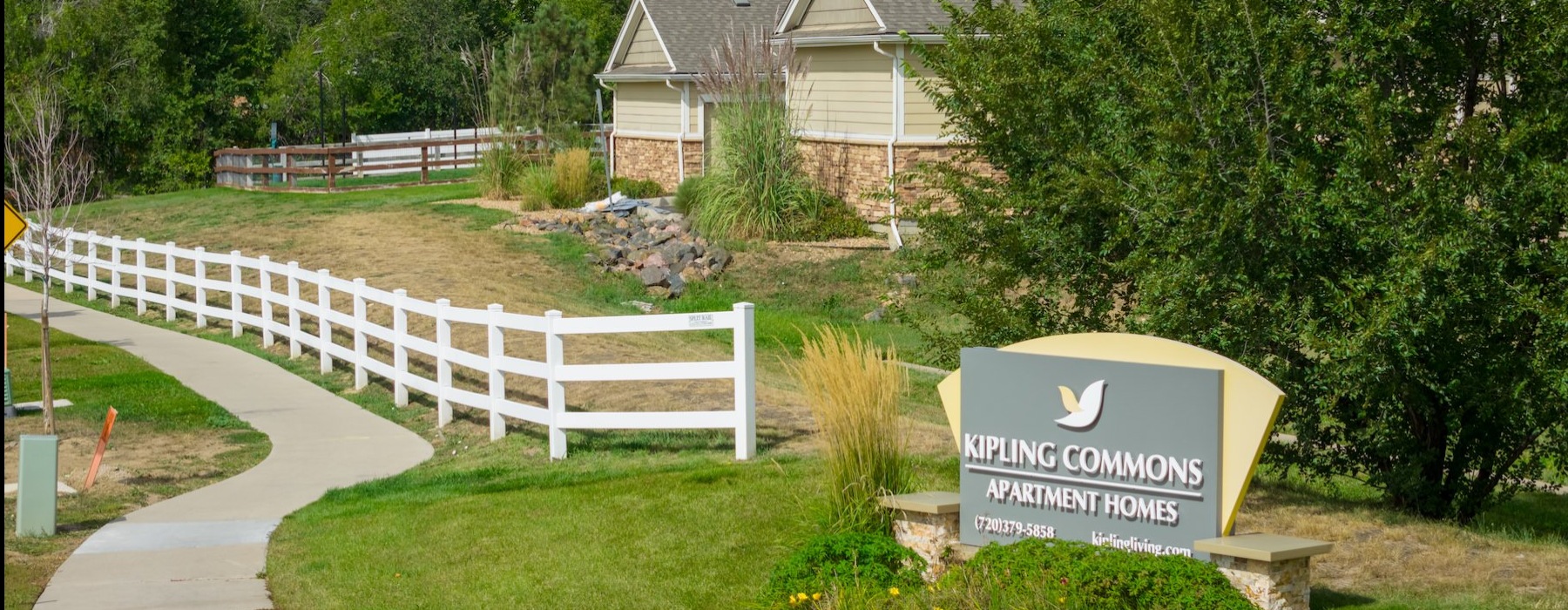 Close to the center of everything a sign near a fence
